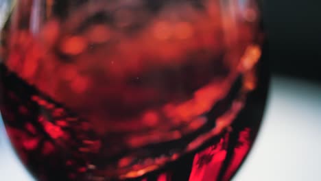 wine swirling in a glass at wine tasting slow motion