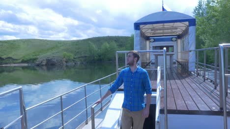 man walking on a river boat