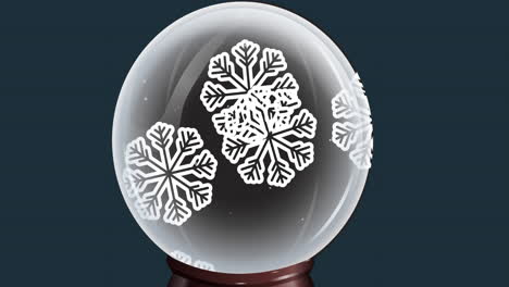animación de un globo de nieve con copos de nieve cayendo sobre un fondo azul