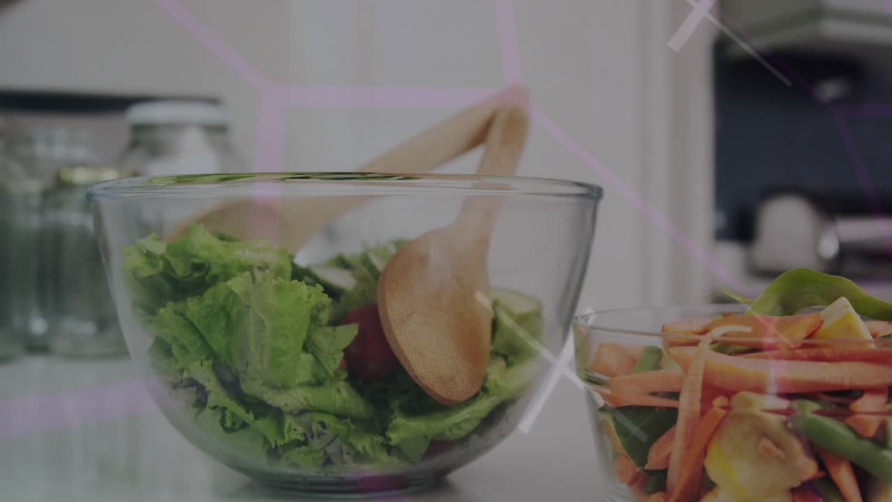 Circuit lines sweeping in and animating nodes over salad bowl fading out showcasing kitchen tech