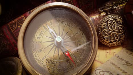 vintage style travel and adventure. vintage old compass and other vintage items on the table.