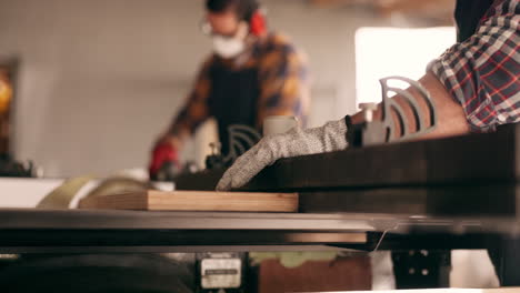 wood, carpenter and hands with people in workshop