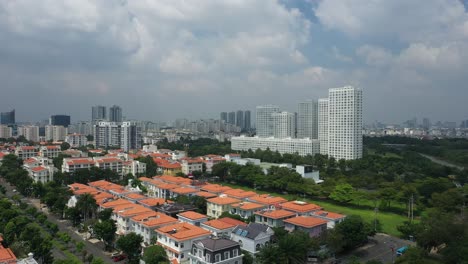 ultra modern city development with residential and commercial high rise buildings, villas, green space and riverfront areas
