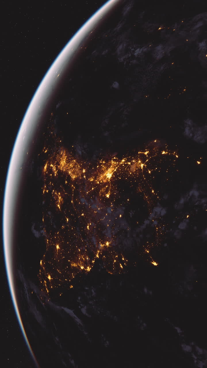 la tierra desde el espacio por la noche con las luces de la ciudad