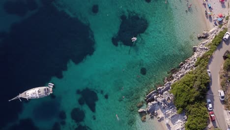 transitioning from coastal road in over the mediterranean sea, high-angle above