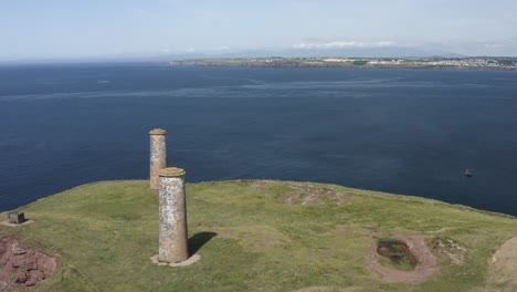 Brownstown-nautical-towers-mark-entrance-to-bay-at-Tramore-Ireland