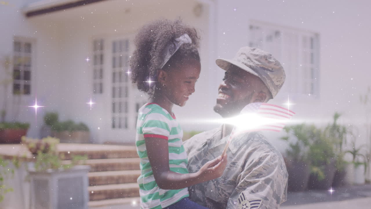 animación de luces sobre feliz soldado afroamericano padre abrazando a su hija