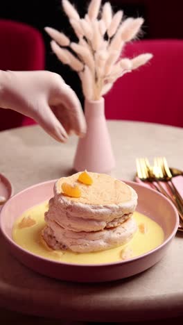 stacked pancakes with custard sauce