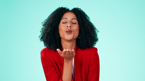 Face,-black-woman-and-blowing-kiss-on-background