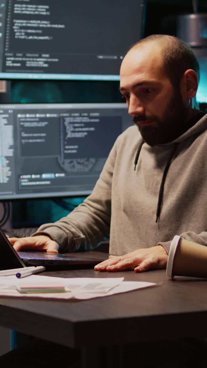 Vertical video: Tired IT engineer sleeping and trying to work on programming
