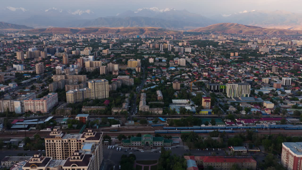 Dense City Of Bishkek At Sunrise In Kyrgyzstan, Central Asia. Aerial Drone Shot