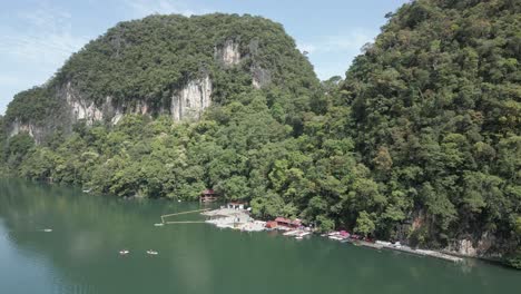 tourists enjoy langkawi karst scenery at lake of the pregnant maiden