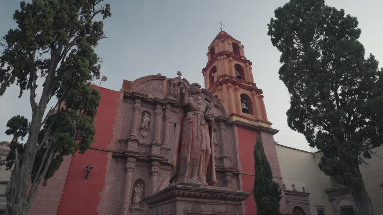Statues of saints in front of churches