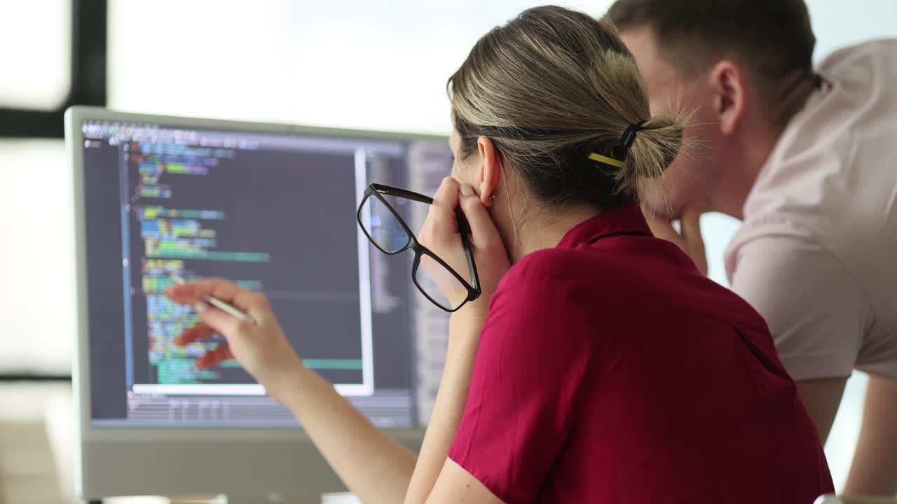 Team working on code together