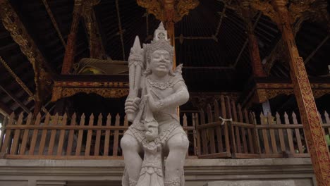 intricate stone statue in the pura gunung kawi sebatu temple, bali