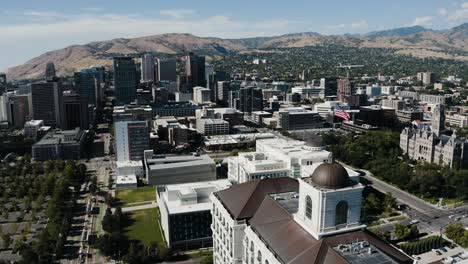 Drone-shot-of-the-American-flag-proudly-flying-over-Salt-Lake-City