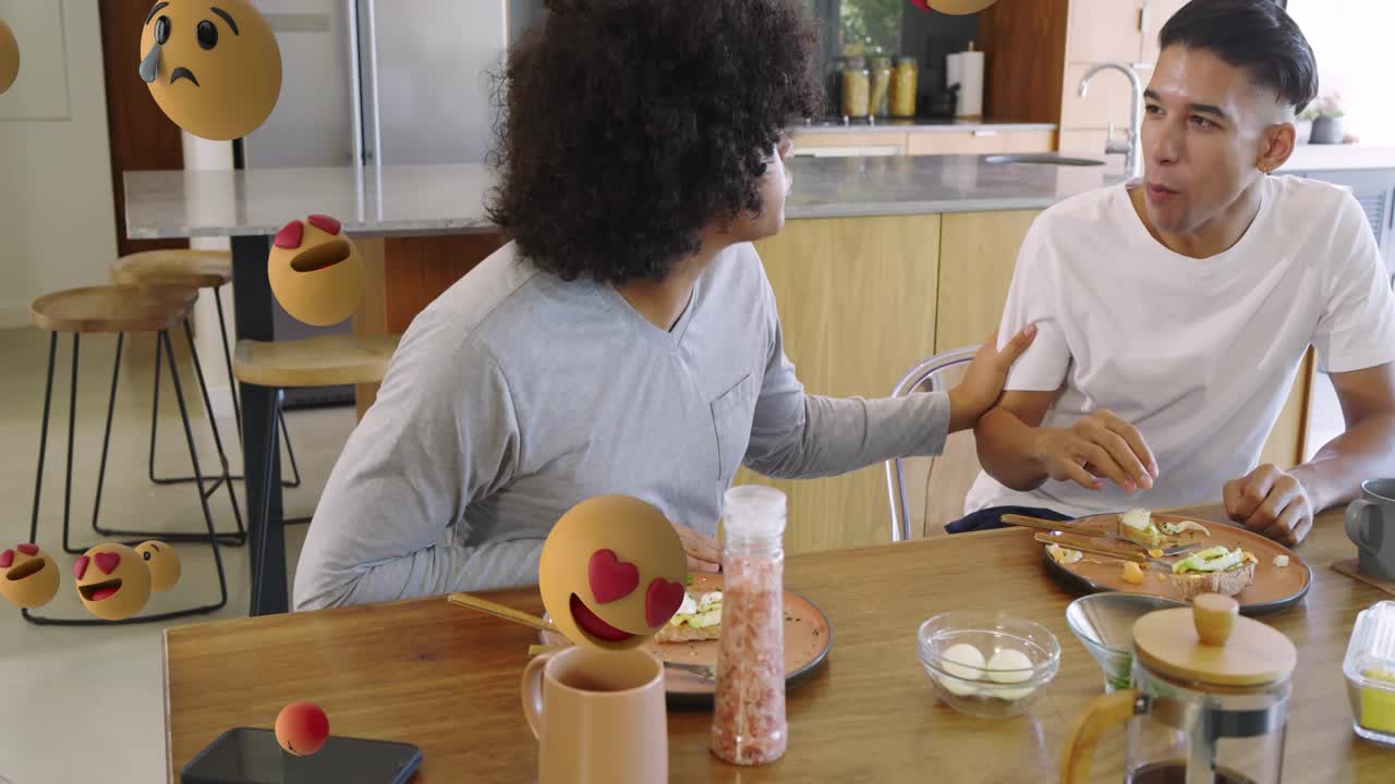Two men arranging ingredients, making and eating avocado toast, sharing meal as emojis multiplying