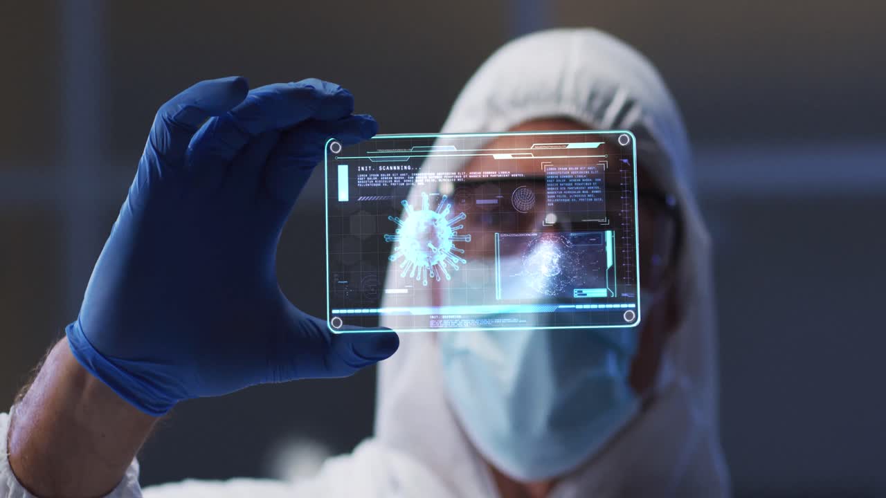 Animation of male scientist holding digital screen with covid 19 cell