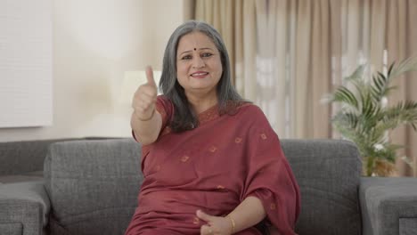 Happy-Indian-old-woman-showing-thumbs-up