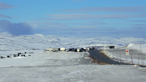 extra wide shot looking down the hardangervidda mountain plateau at dyranut with the r7 road in april 2025