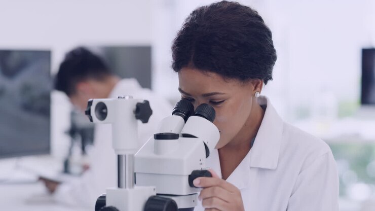 A healthcare professional analyzing samples