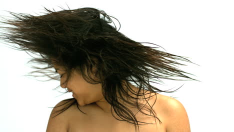 brunnette tossing her hair