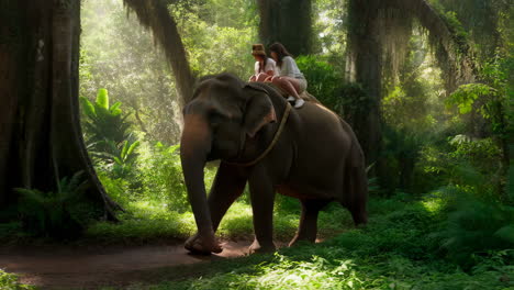 two women riding an elephant through a lush jungle