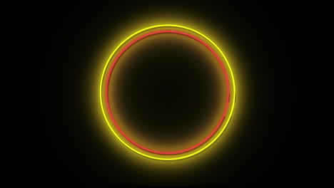 animación de círculos rojos y amarillos de neón sobre fondo negro