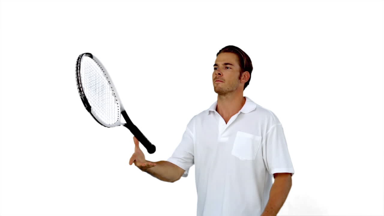 Tennis player throwing his racket