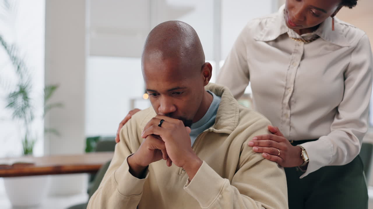 Man receiving support from a compassionate friend