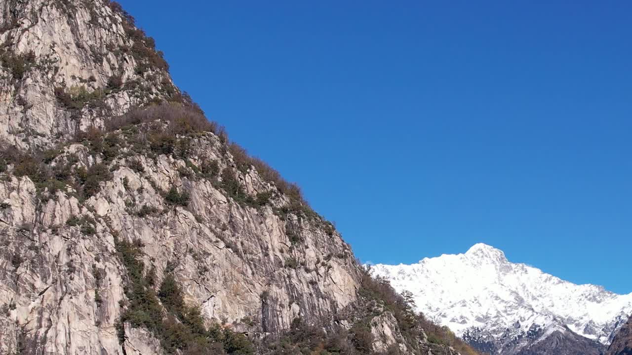 Stunning aerial view of the Italian Alps featuring rocky peaks