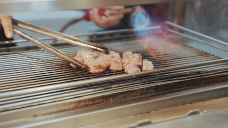 a sizzling scene of a taiwanese street food vendor expertly flame-torching juicy beef cubes, capturing the fiery preparation and mouthwatering appeal of this popular night market delicacy