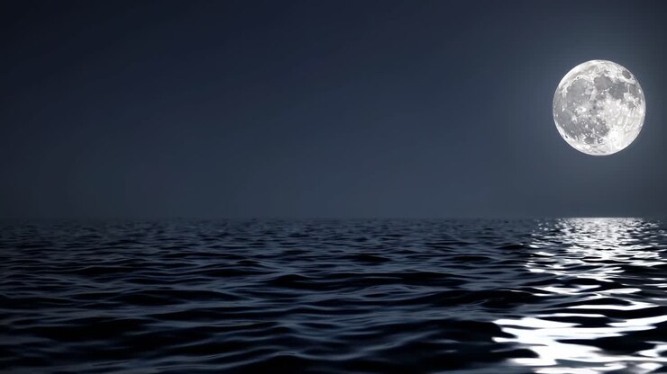 A serene night ocean scene with a full moon reflecting on water