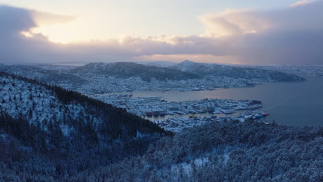 downtown bergen seen from the mountains on a beautiful snowy winter day