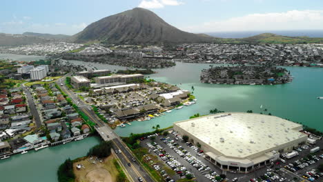 aerial of buildings on the water in hawaii