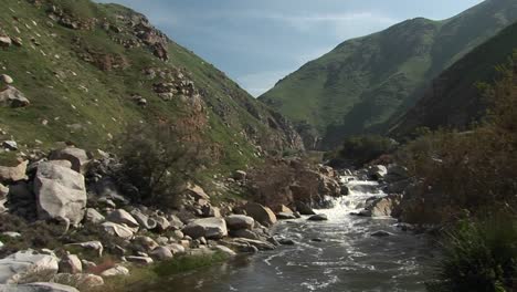 wide shot of the kern river flowing down falls through a canyon in the sierra nevada mountains