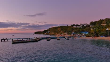 Slide-to-the-left-Drone-Shot-of-Crash-Boat-Beach-sunset-located-in-Aguadilla,-Puerto-Rico