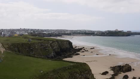 ascending reveal of scenic lusty glaze beach near newquay on the cornish coast of england