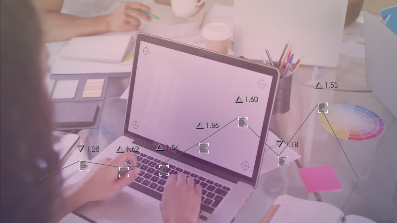 Hands typing on laptop with data analysis animation over office desk