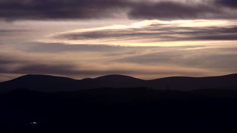 scenic view of sky during sunset over mountain ridges silhouette in south ireland near dublin