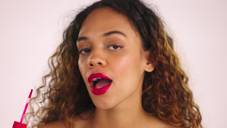 Face,-kiss-and-woman-with-red-lipstick-application