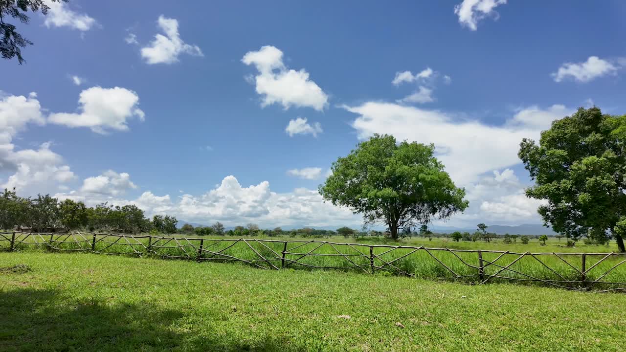 Time lapse clouds passing over Mikumi national park savanna in the Tanzania wilderness