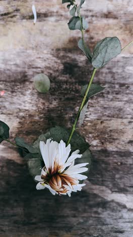 delicate floral arrangement on wooden tabletop