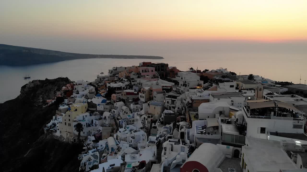 Drone footage over Santorini during sunset