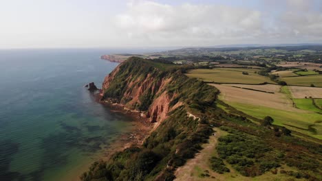 aerial view of picturesque english coastline in devon