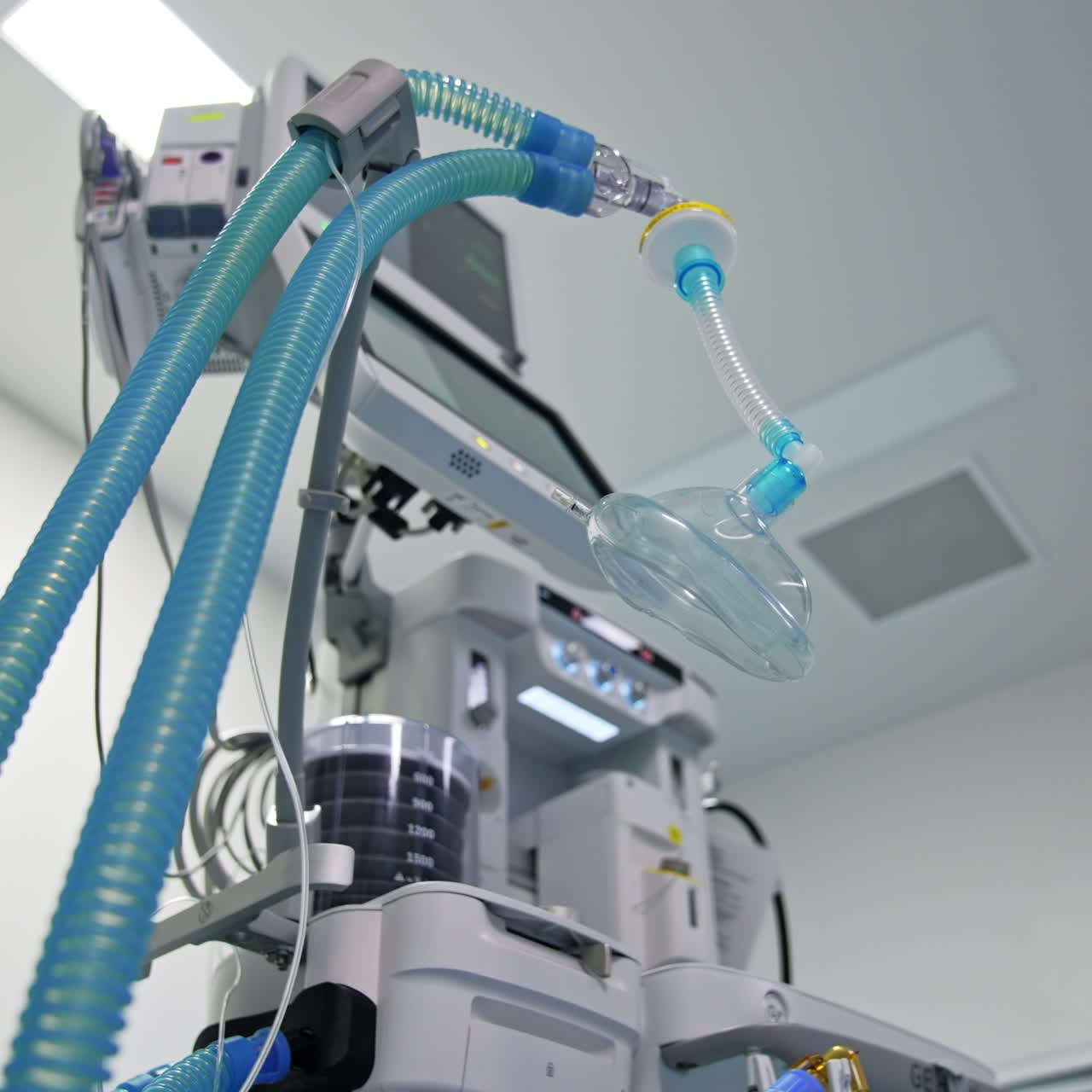 General anesthesia oxygen mask for patient at operations. Low angle view. Advanced equipment at backdrop
