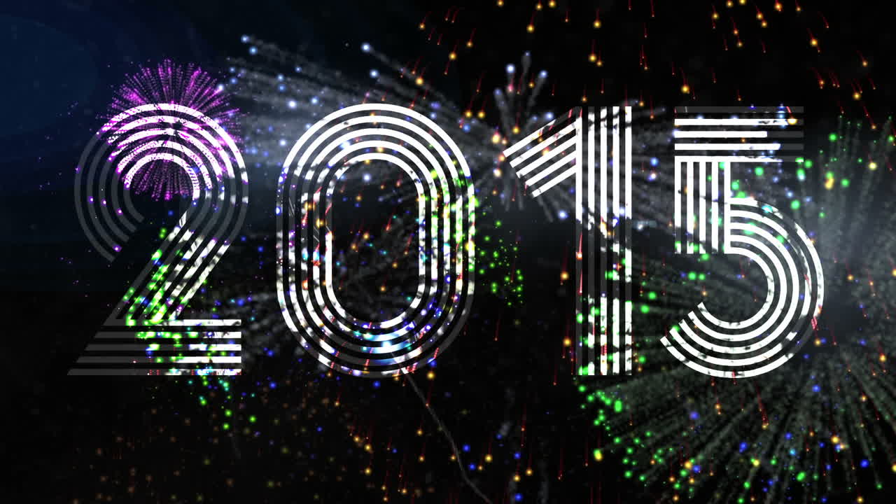 Seamless colourful fireworks exploding with 2015
