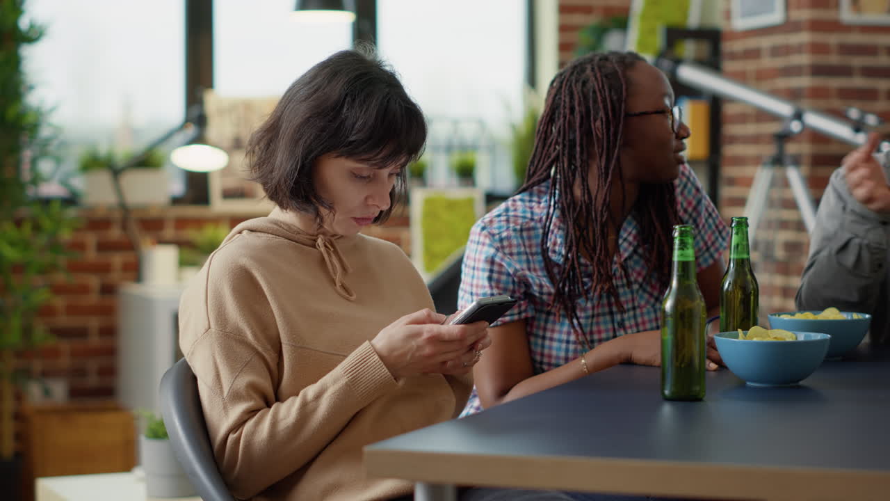 Millennial people sharing social media memes on mobile phone