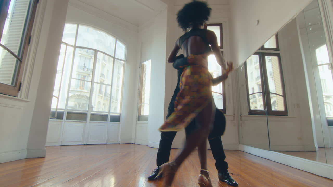 Professional Dancers Practicing Argentine Tango in Studio