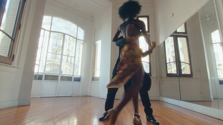 Professional Dancers Practicing Argentine Tango in Studio